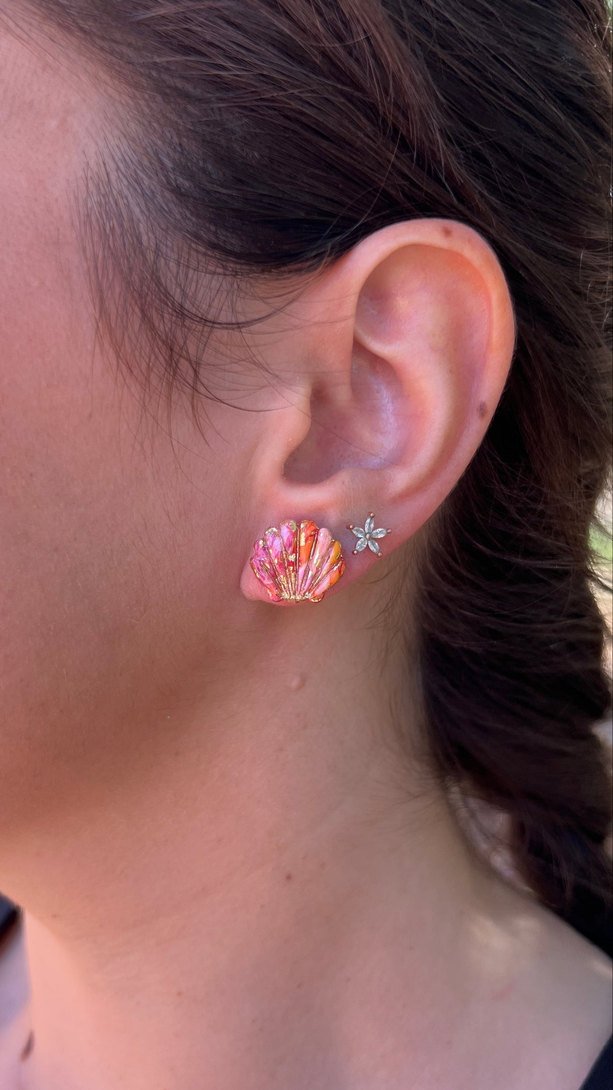 Puces d'oreilles coquillages