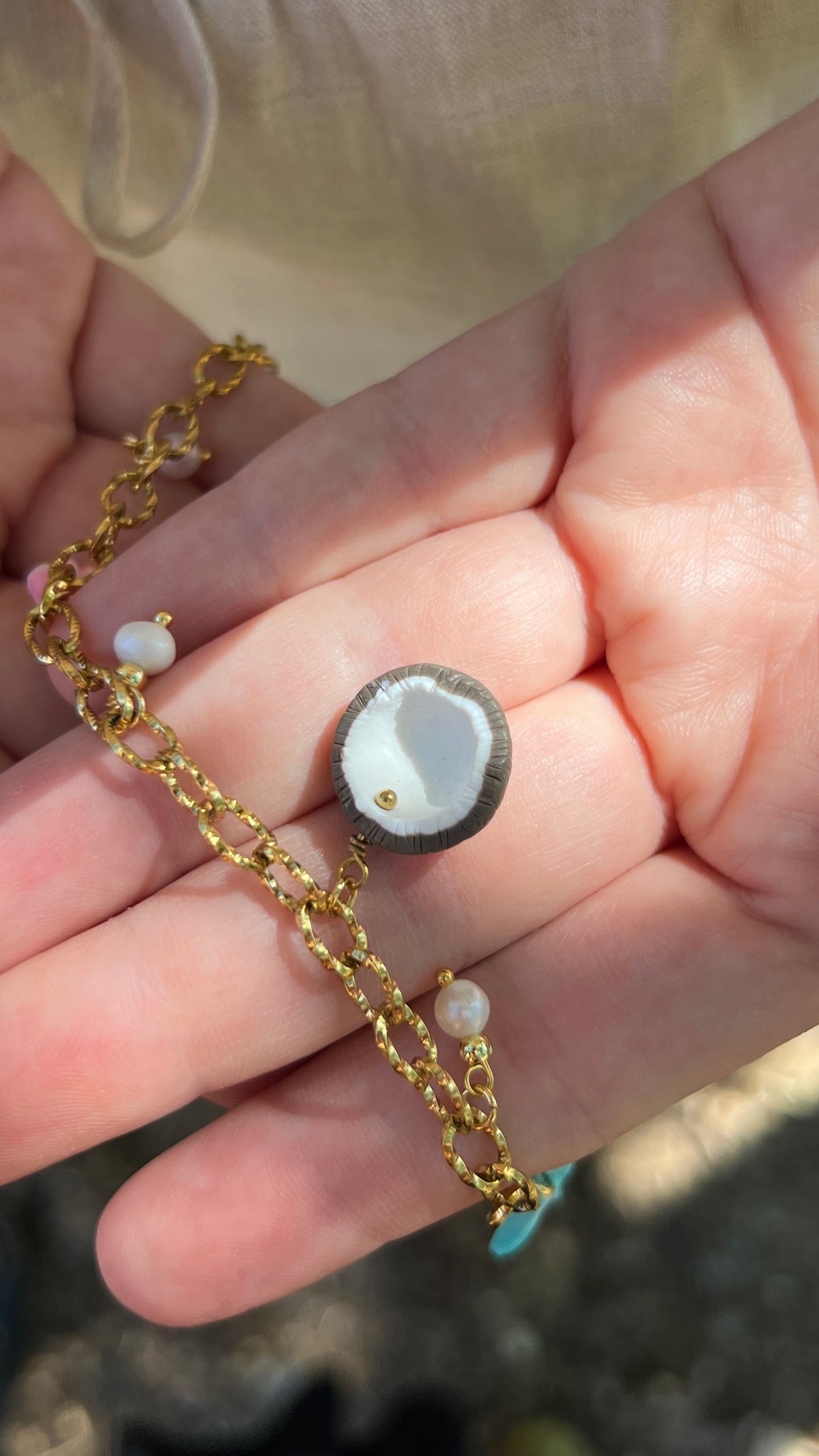 Collier à charms – Étoile de mer, noix de coco & coquillage