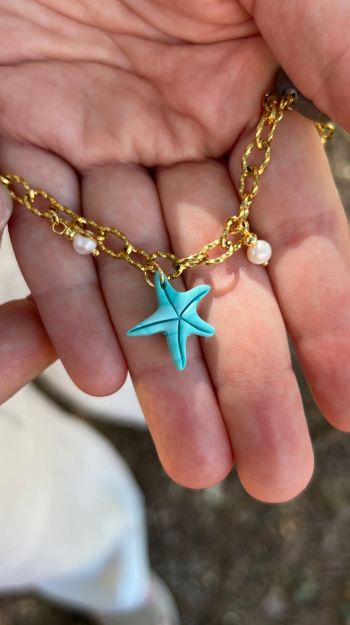 Collier à charms – Étoile de mer, noix de coco & coquillage